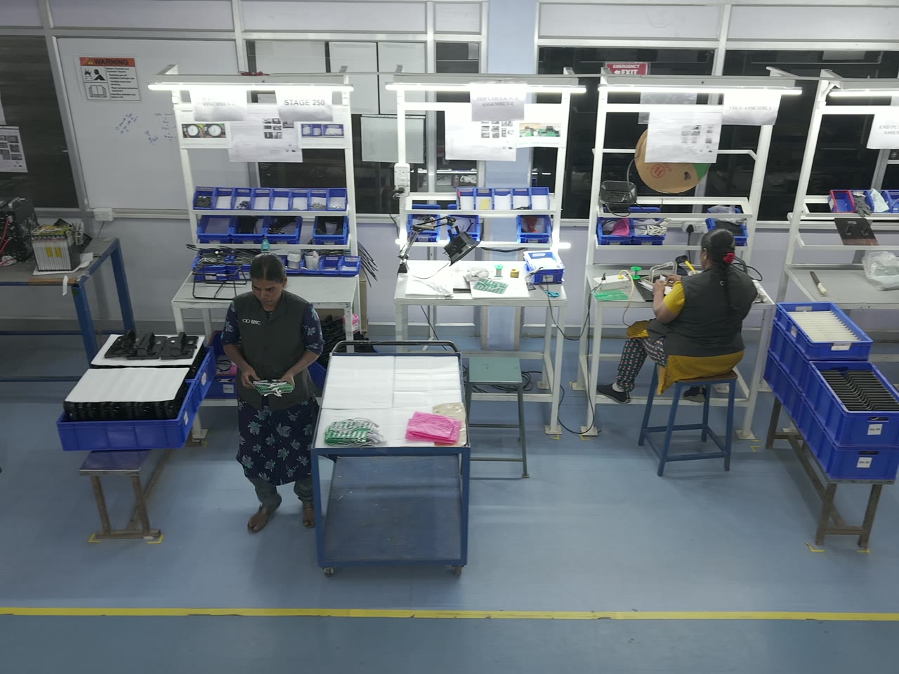 Operators at the electronics workbenches