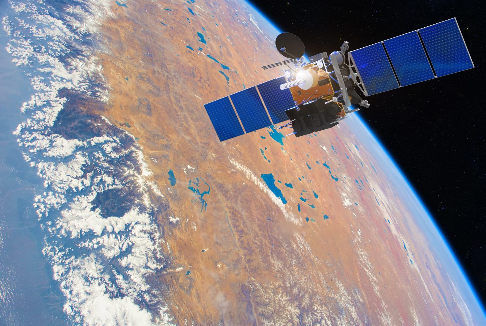 Communications satellite with solar panels in low orbit above Earth