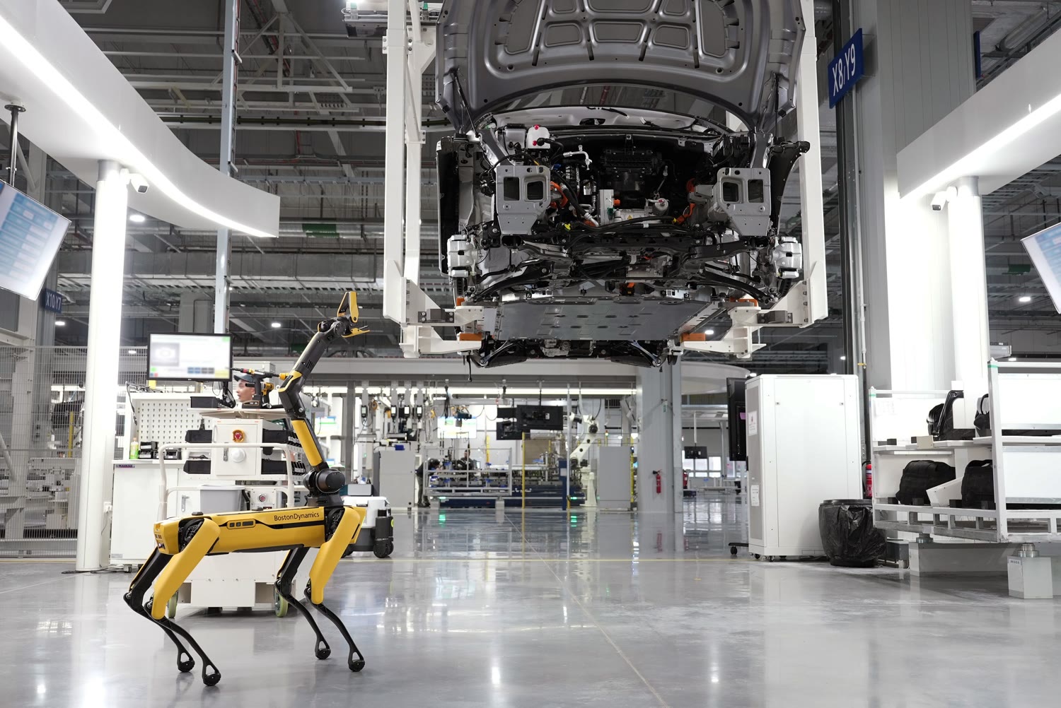 Robot and automation on an EV manufacturing assembly floor